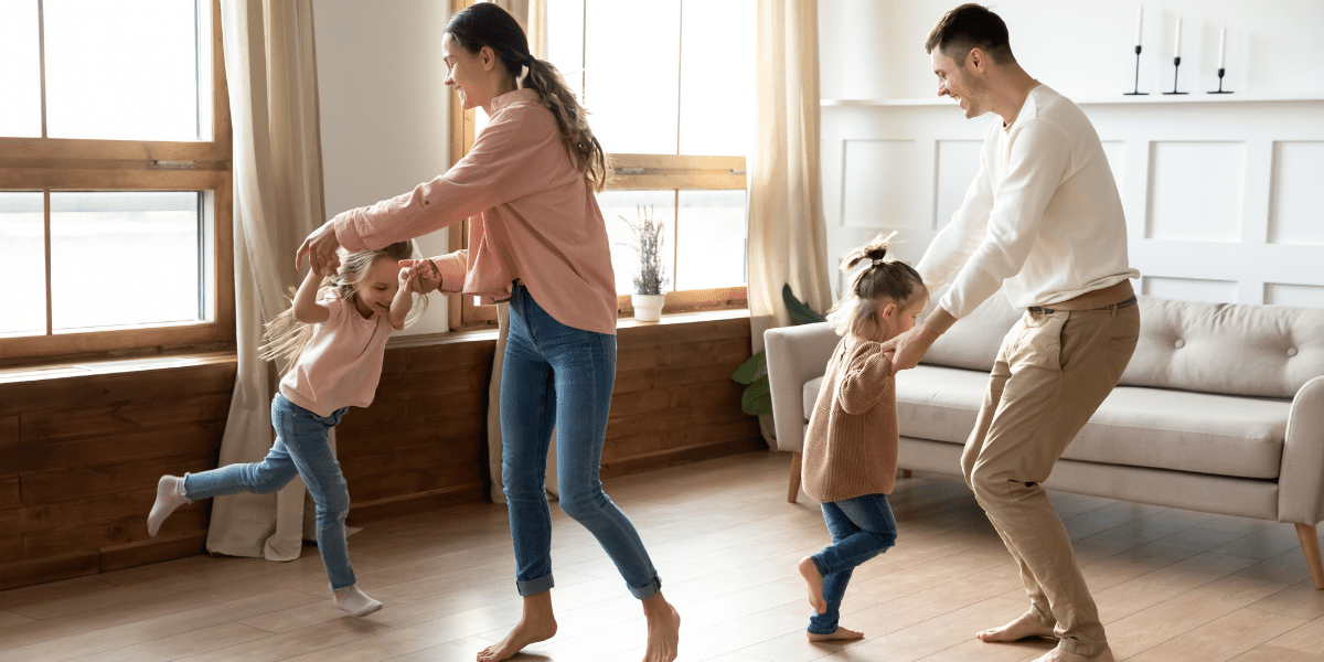 Energy Boost - Mom and dad playing with little children